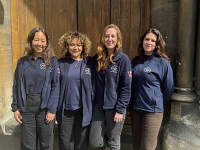 Group of 4 women wearing HALO Trust jumpers